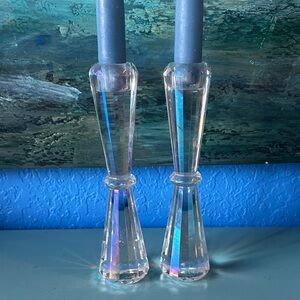 A Pair of Iridescent Crystal Candle Holders with Blue Candles